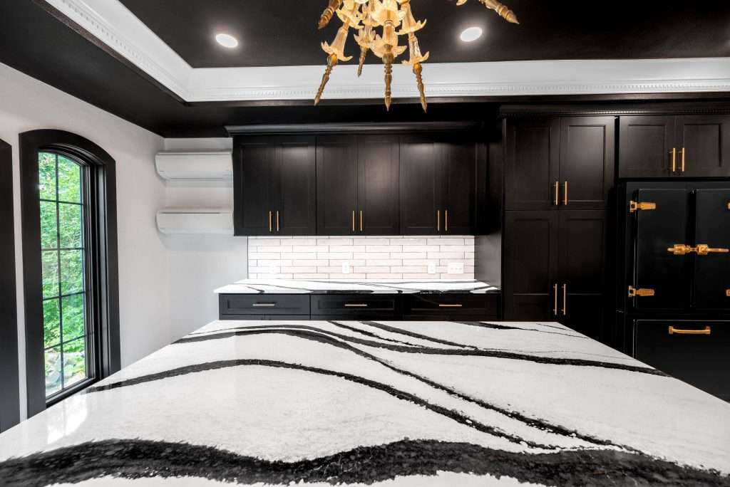 Black and white kitchen remodel with gold accents