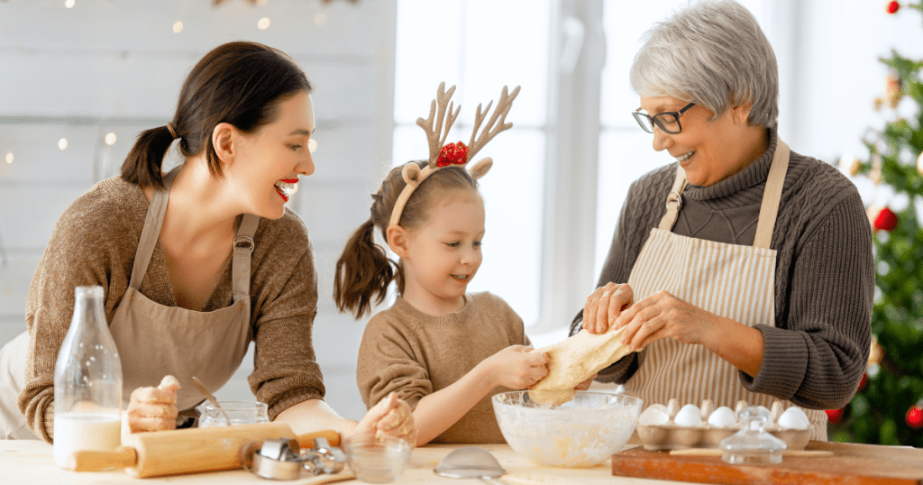 mom grandma and daughter baking cookies