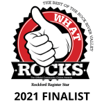 Logo featuring a thumbs-up symbol inside a red circle with a jagged border. Text reads "The Best of the Rock River Valley What Rocks," "The Official Community Choice Awards," and "Rockford Register Star.